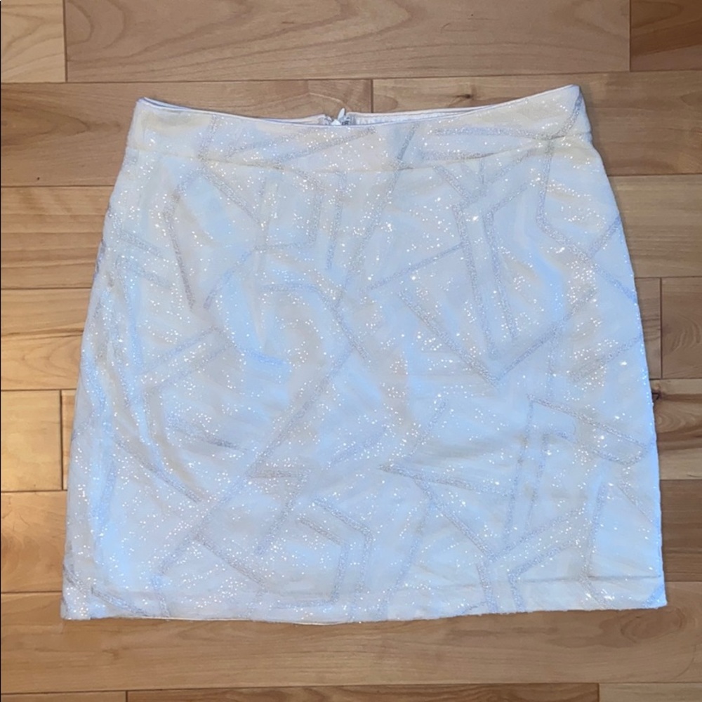 White and silver lined mesh sequin mini skirt